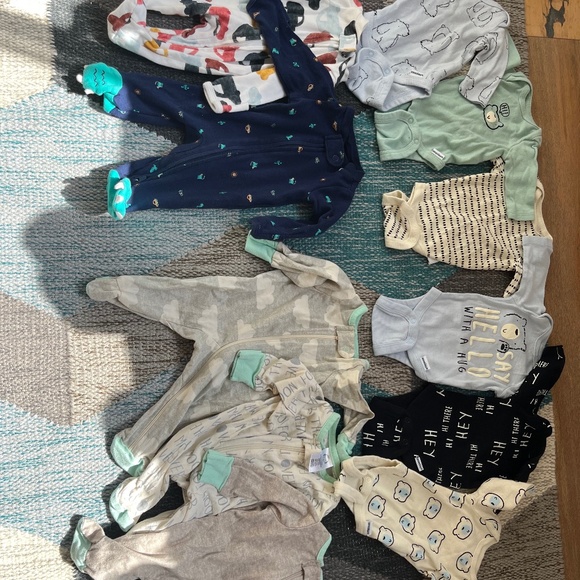 Eleven preemie onesies (carters and gerber)